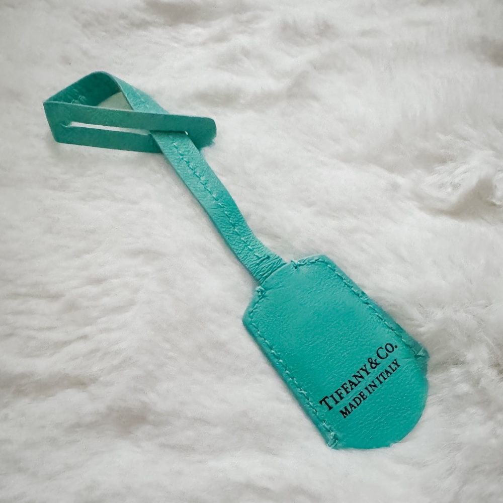 Tiffany & Co. Leather luggage Tag with Silver charm